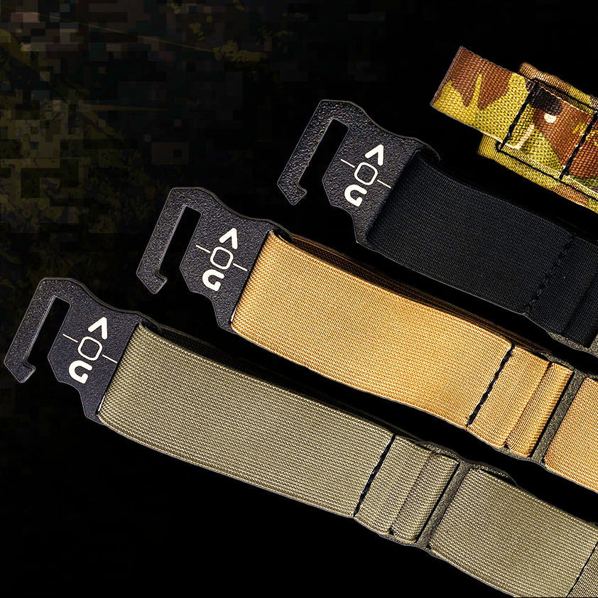 Four EDC Flex tactical belts in black, Coyote Brown, Ranger Green, and Multi-Cam Green, with black buckles on a dark background